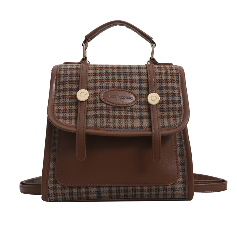 Alta textura simple color sólido estilo coreano bolso de las mujeres 2023 invierno nuevo nicho diseño hombro crossbody bolso