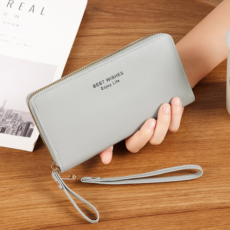 Nueva versión coreana de la billetera larga de damas, billetera de negocios de lujo ligera, moda multi-tarjeta billetera con cremallera al por mayor