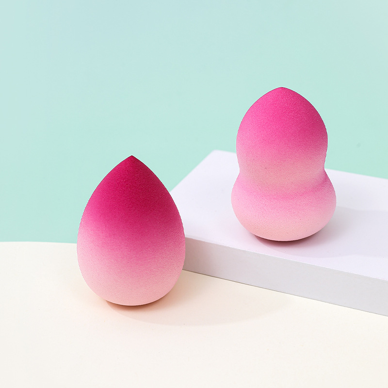 Estilo transfronterizo color degradado maquillaje de huevo soplo de polvo no látex color spray en forma de calabaza maquillaje esponja maquillaje huevo personalizado de fábrica