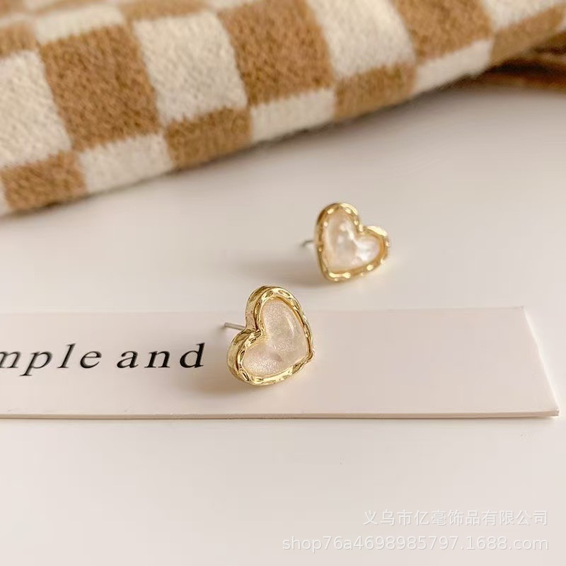 S925 Pendientes de perlas de temperamento Pendientes de lujo ligero de alta gama Pendientes al por mayor y al por menor transfronterizos Mujeres