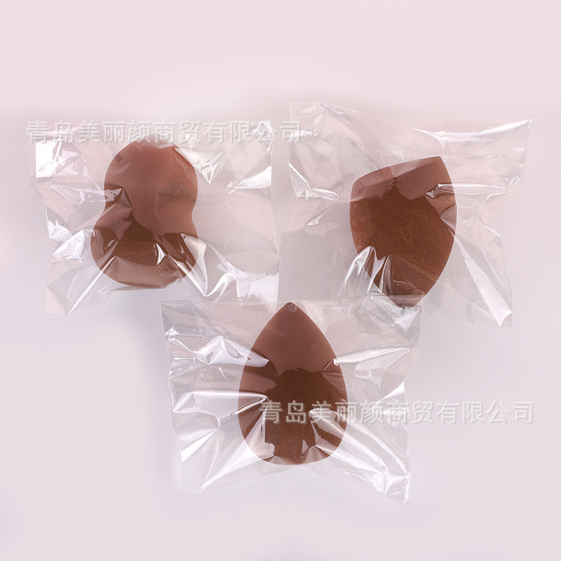 Embalaje independiente belleza huevo poliuretano maquillaje esponja polvo húmedo y seco soplo no-látex fábrica de bolas de maquillaje al por mayor