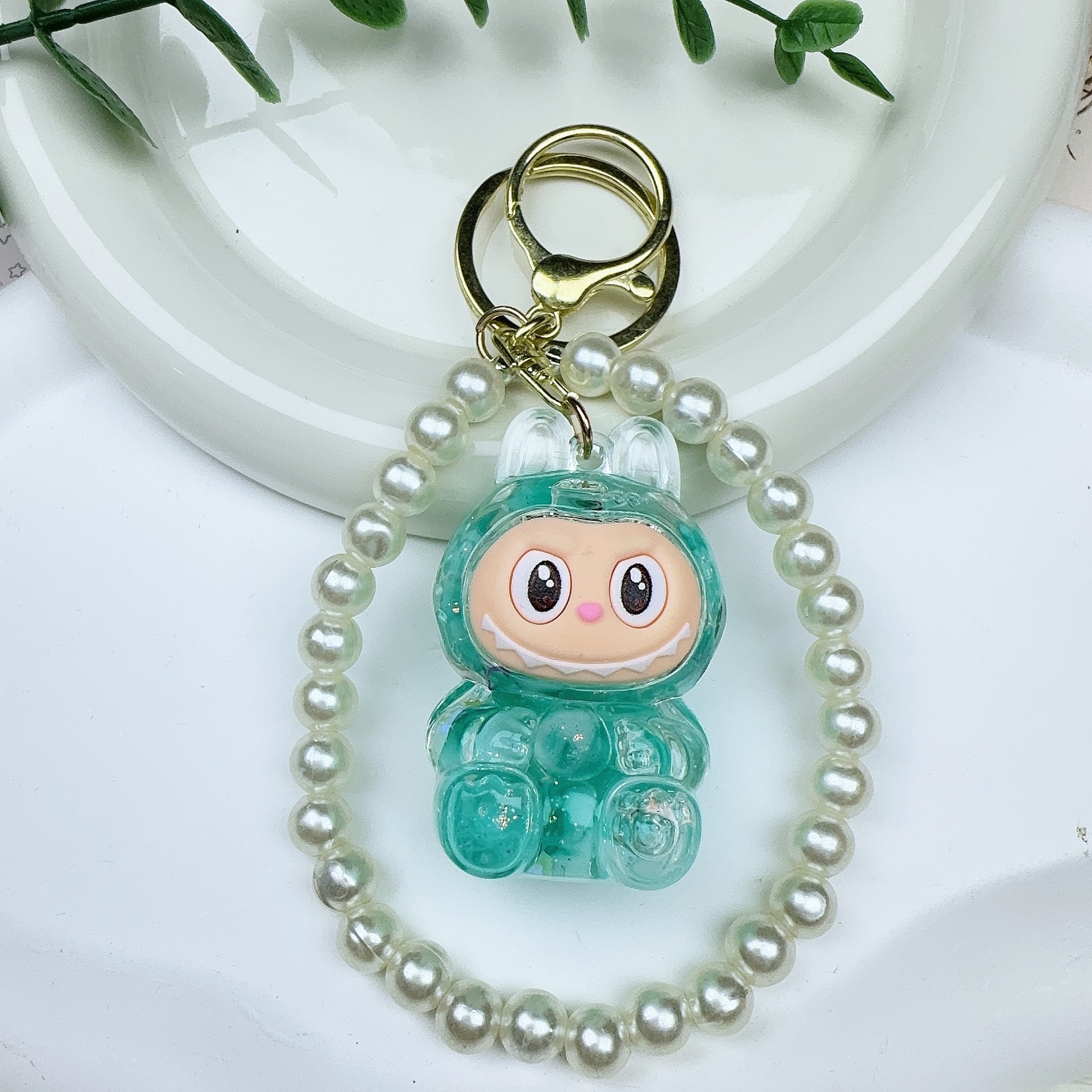 カラービーズ点滅発光ラブブクリエイティブキーホルダーオイル人形スクールバッグ流砂小さなペンダントギフト装飾品