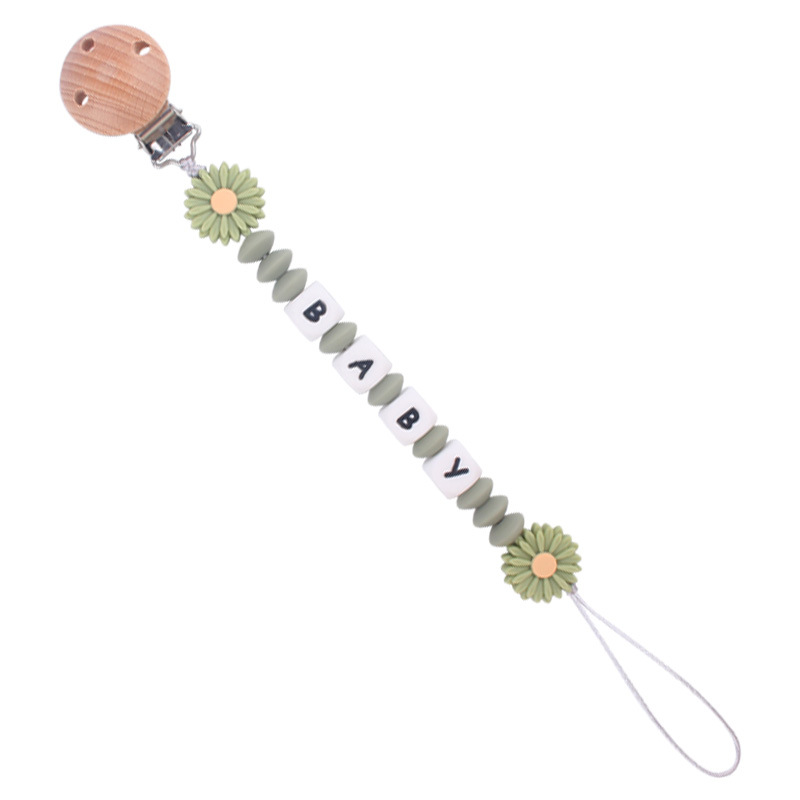 Nuevo bebé suministros de dibujos animados margarita teether creativo bebé DIY mordedura molar pezón cadena anti-gota cadena