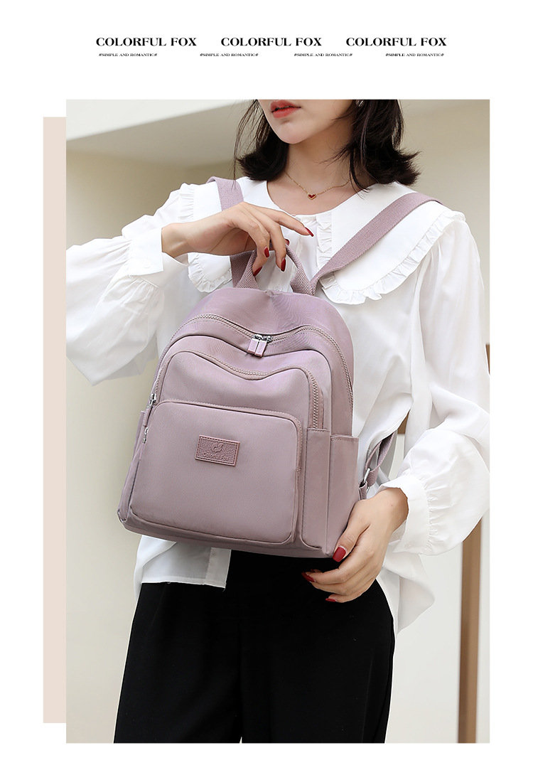 Colorful Fox's new backpack, a large-capacity casual backpack for women, is water-resistant and multi-layered for travel students undefined