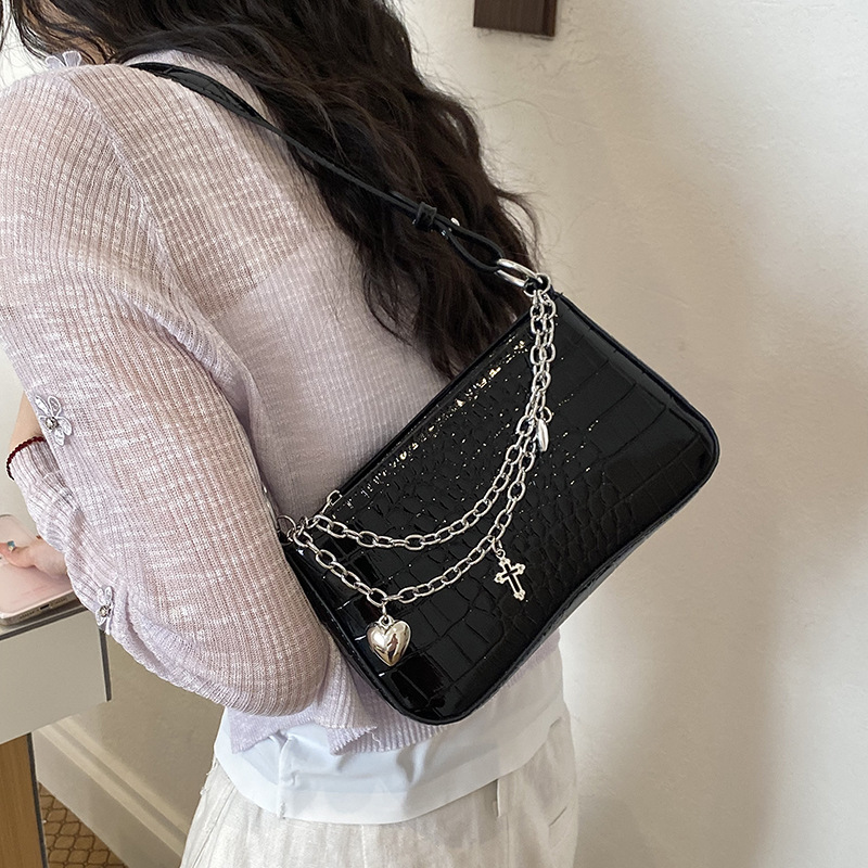 Nicho de diseño de cadena de viaje bolso pequeño para mujeres 2026 verano nuevo estilo de alta calidad cocodrilo mochila de hombro