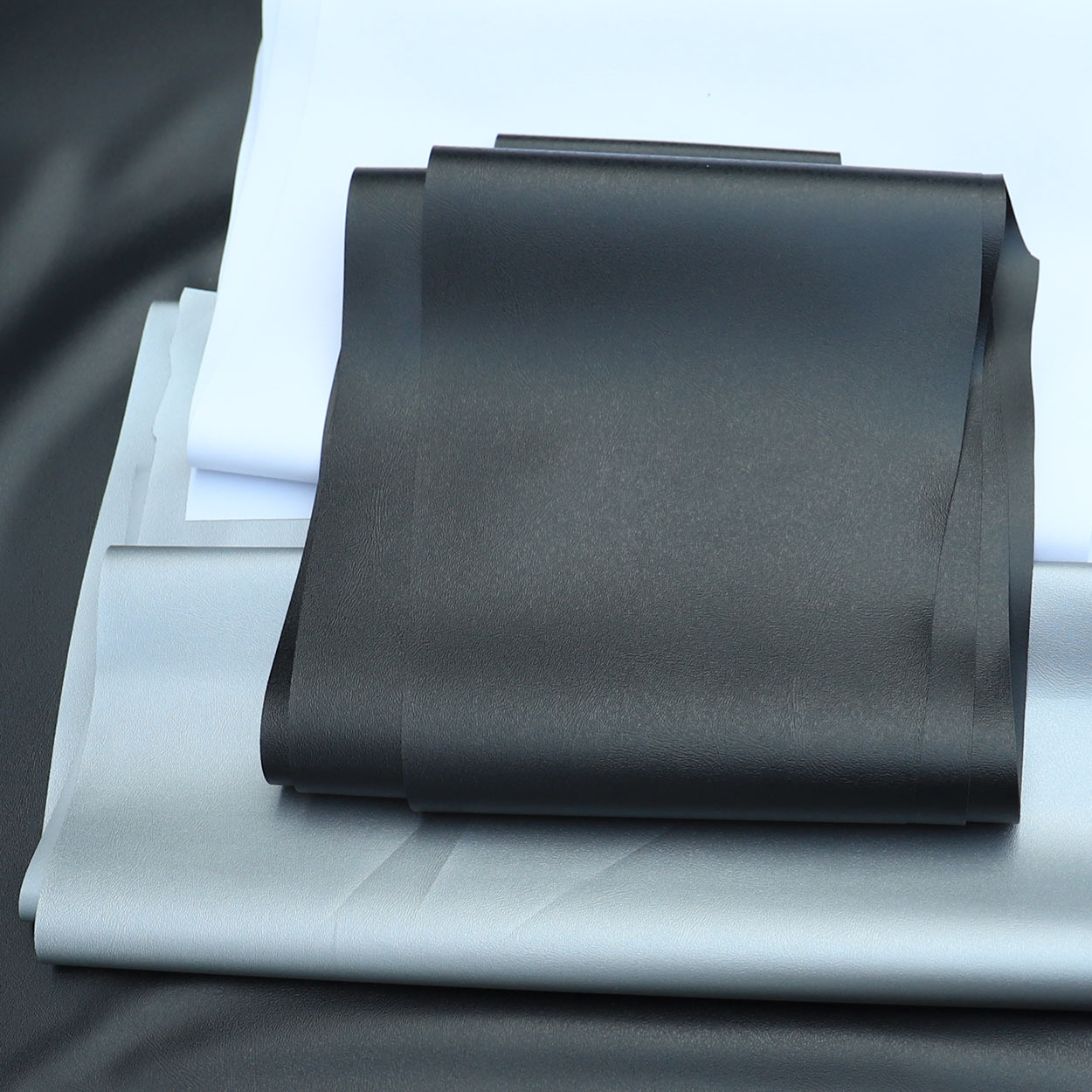 PVCQ纹压纹薄膜黑白银实色压延塑料软胶膜手袋箱包装材料PVC薄膜-阿里巴巴