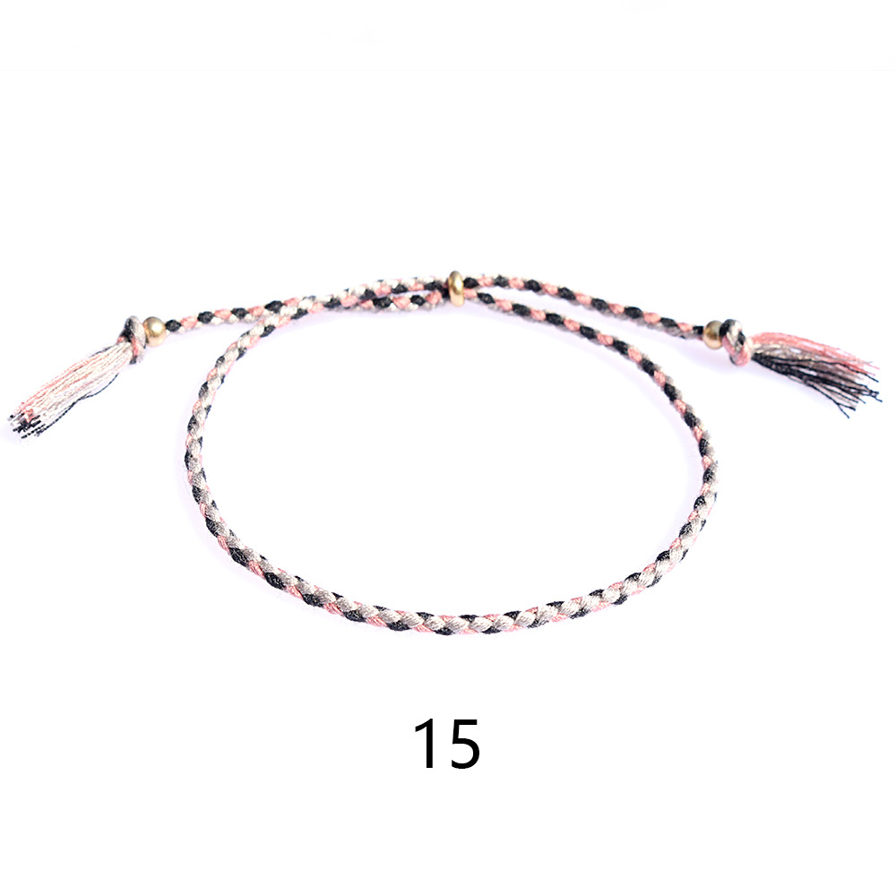 Amazon popular colorido cuerda de algodón amistad pulsera perlas de cobre borla pulsera tejida a mano ajustable hombres y mujeres pulsera