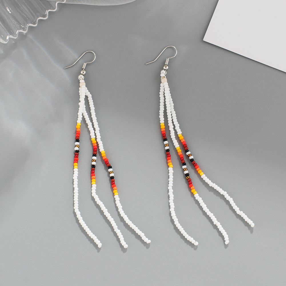 Summer Bohemian handmade tassel rice beads earrings women's long temperament European and American woven earrings earrings wholesale