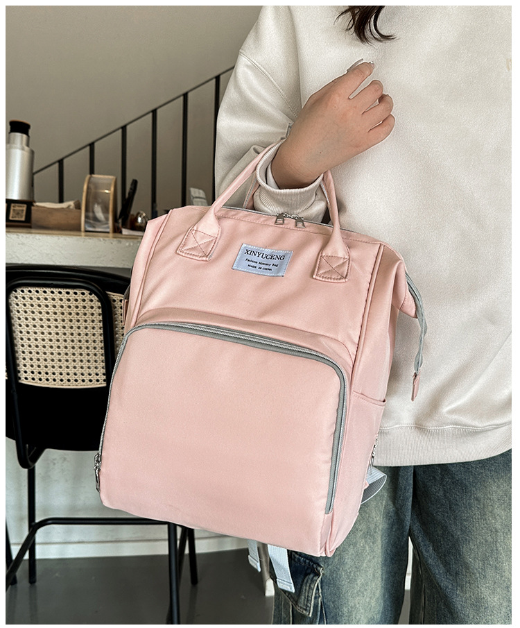 Solid-color lightweight mom bag, a backpack for taking kids out, multi-functional large-capacity mother and baby bag for girls undefined