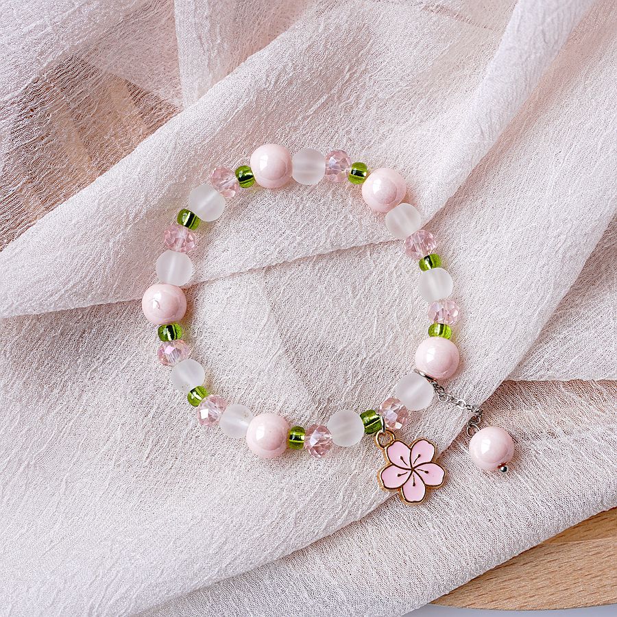 thumbnail image 1 of 2022 primavera y verano nueva pulsera de flor de cerezo con cuentas de cristal popular japonesa y coreana pulsera de perlas de gradiente rosa literario simple 676D flor de cerezo rosa uno, 1 of 2
