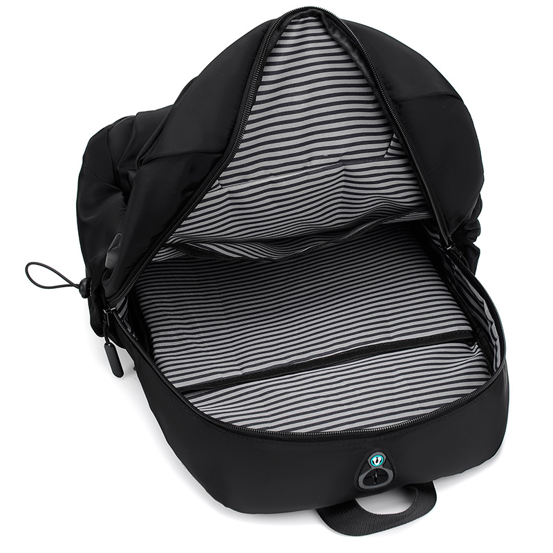 2022 Otoño e Invierno moda casual estilo simple mochila de los hombres bolsa de la computadora de carga USB agujero mochila de cercanías