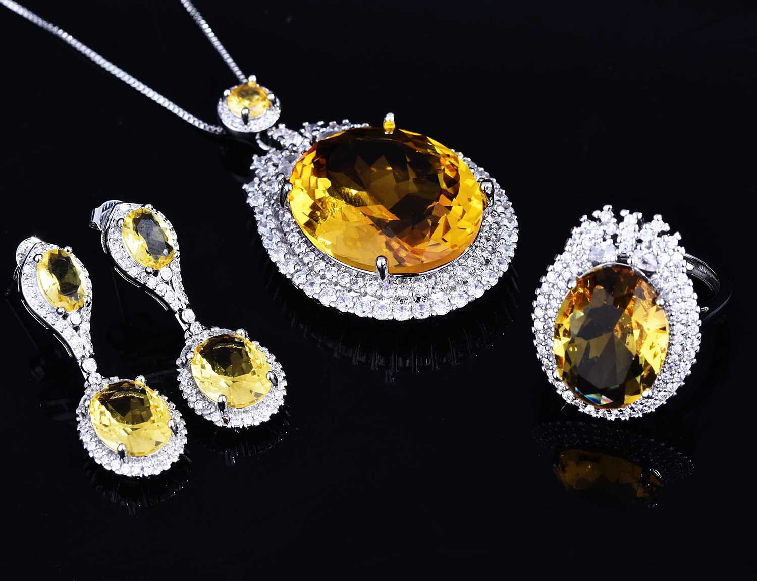 Pigeon Egg Golden Diamond Color Pendant Long Earrings Open Ring Female Wholesale display picture 12