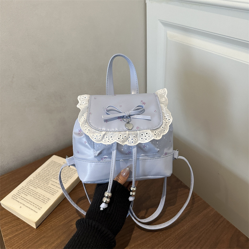 Mochila de encaje fresca y de alto valor, lindas flores, nueva bolsa de mano de alto nivel, mochila de viaje casual.