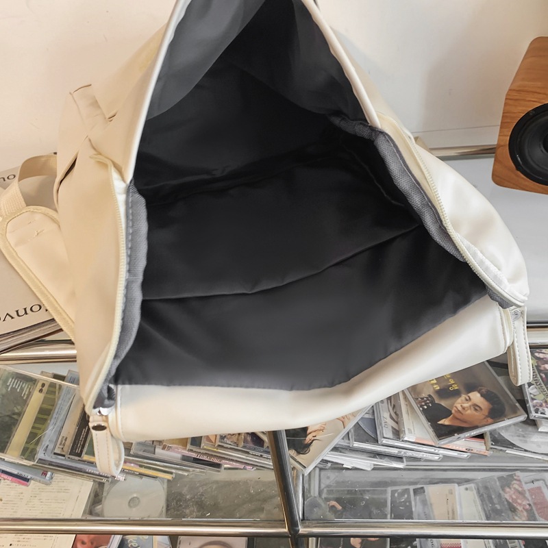 La nueva versión coreana de Amazon de la mochila de cuero suave para estudiantes de secundaria