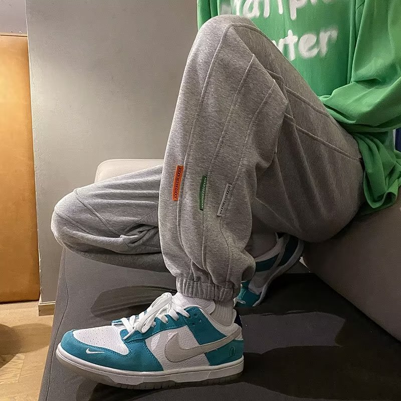 Pantalones con corsé de verano y otoño, pantalones deportivos para hombres, marca de moda, pantalones casuales sueltos de gran tamaño, pantalones cortos de todo fósforo para hombres