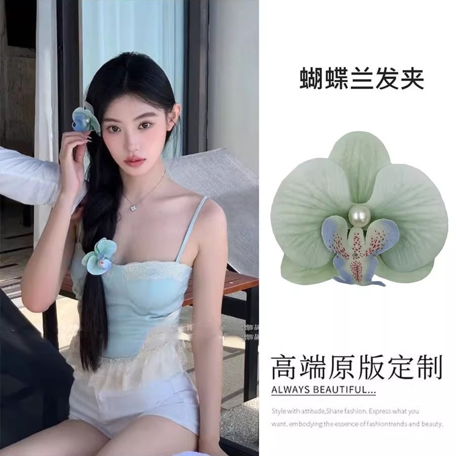 Puramente deseoso de viento colorido primavera orquídea mariposa broca de flores laterales flores simuladas tocado de flores al por mayor acrobacias para el pelo de viajes al mar