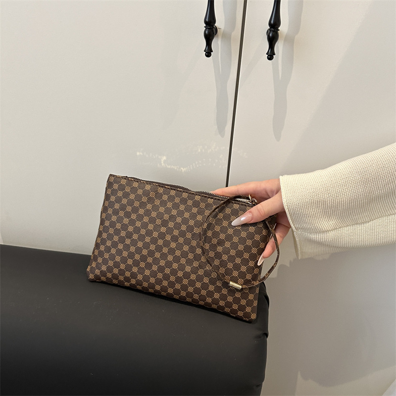 Impresión cuadrada otoño e invierno bolsas de mano casuales universales para mujeres de alta calidad temperamento simple nicho de moda bolsas de cena