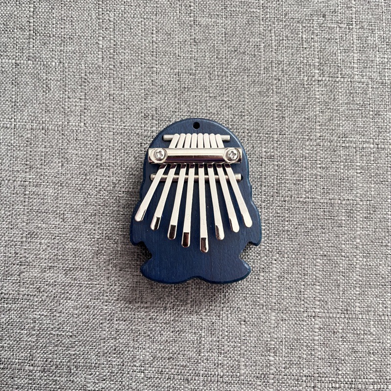 Instrumentos musicales Transfronterizo de 8 tonos Mini Pulgar Kalinba Cristal de madera maciza Piano transparente de cinco dedos Artesanía portátil Piano de dedo