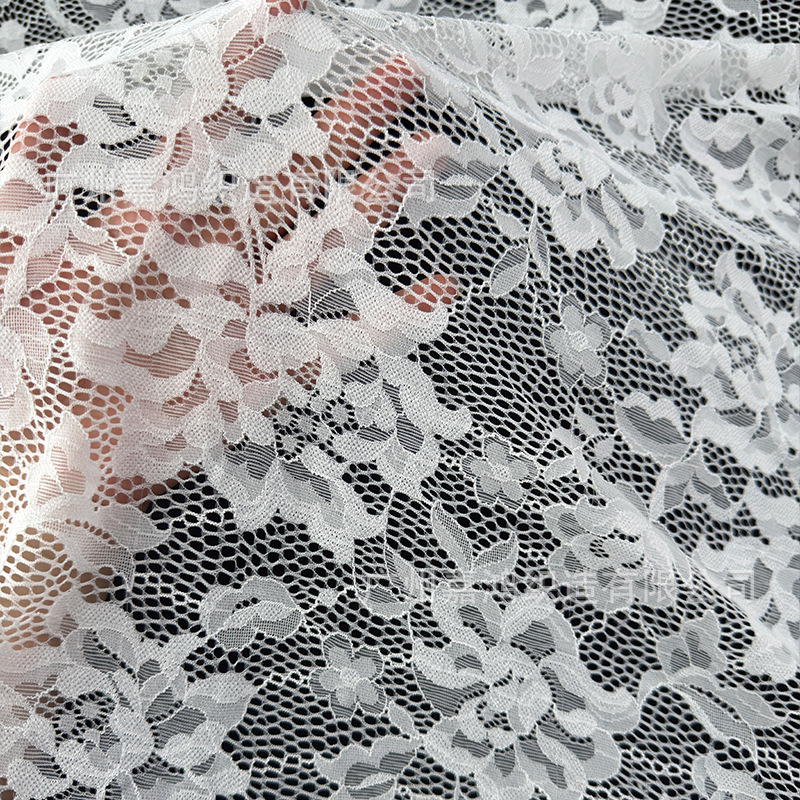 Primavera y verano nueva fábrica directa encaje floral elástico hacer falda de ropa de mujer tela de chaqueta