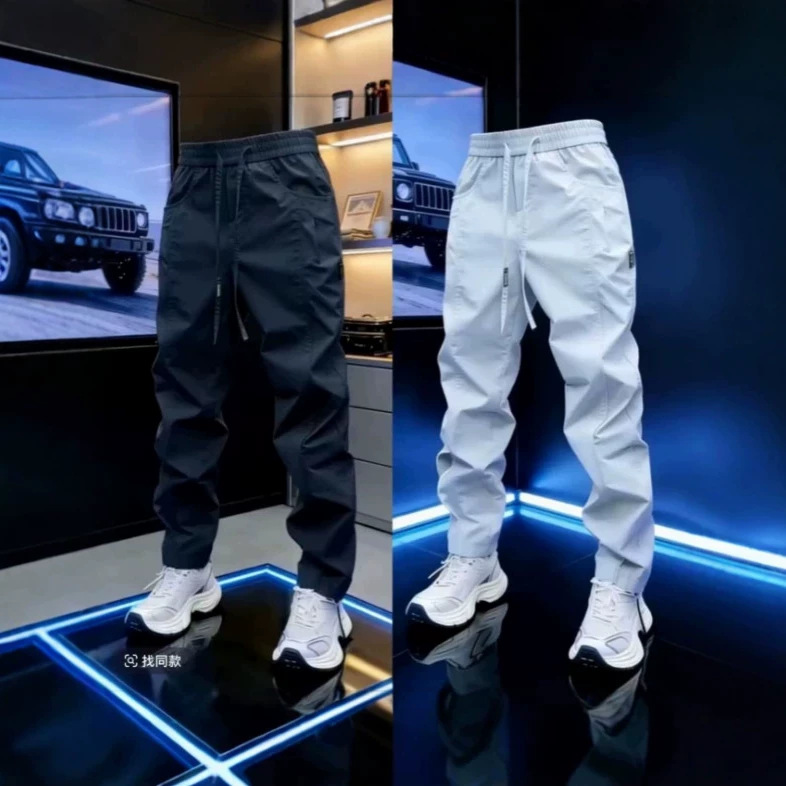 High-end 2026 Spring/Summer men's sporty windproof pants, fashionable outdoor style, comfortable, loose fit, stretchy, slimming, casual pants.