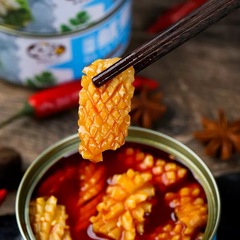 Internet-famous spicy mini seafood squid flower canned goods, 100g per can—direct factory supply for ready-to-eat, cooked seafood delicacies.