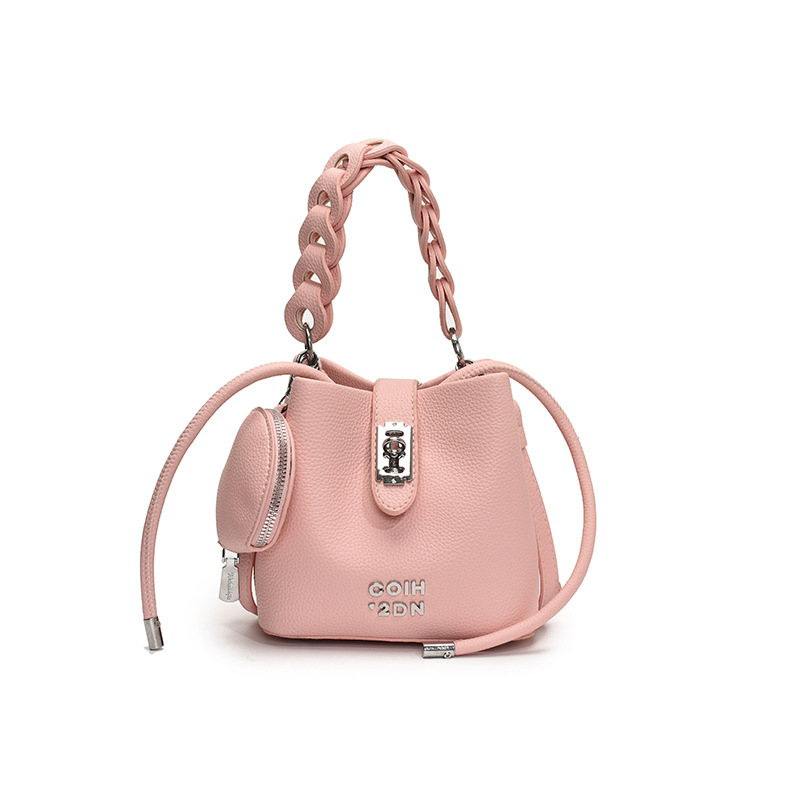 Bolso de mujer 2025 nuevo bolso de mensajero de hombro con patrón de lichi de alta calidad bolso de cubo portátil de moda casual de todo fósforo