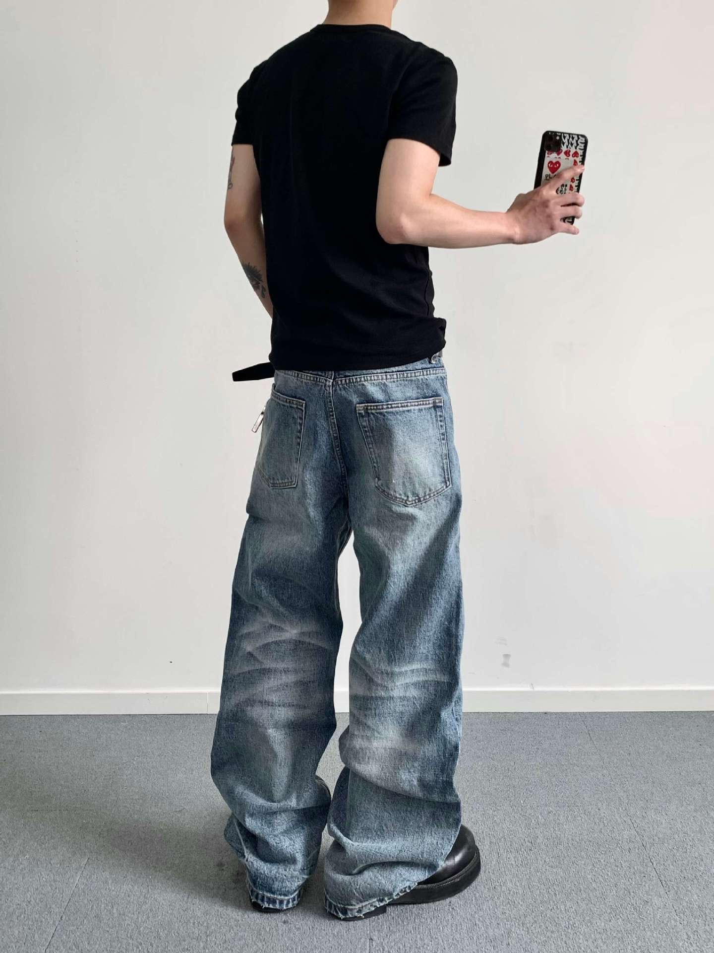 EMEメンズ牛王シリーズ夏水洗い立体郭形自然猫須垂感は古いアーチ形のジーンズを作ります。