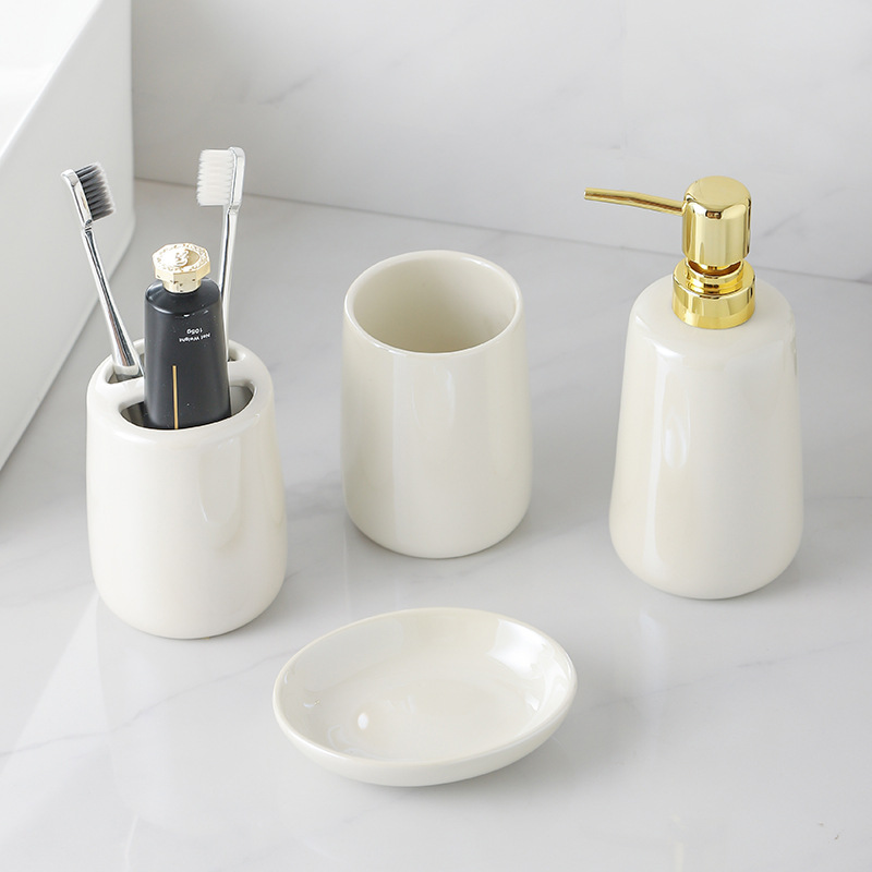 Kit de lavado de lujo ligero y alto valor de la cara botella de embalaje de baño blanco puro botella de emulsión de baño cerámica de cuatro piezas