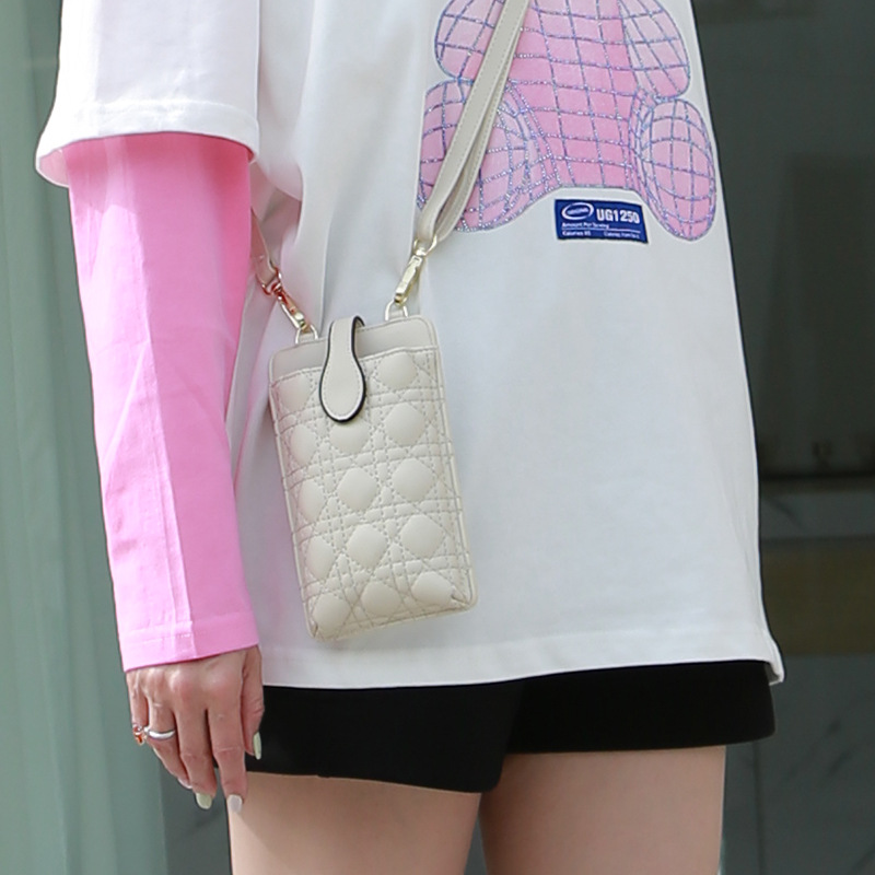 Mini bolso pequeño 2024 verano nuevo universal portátil Japón y Corea del Sur hilo bordado mujer mensajero cuello colgante bolso monedero