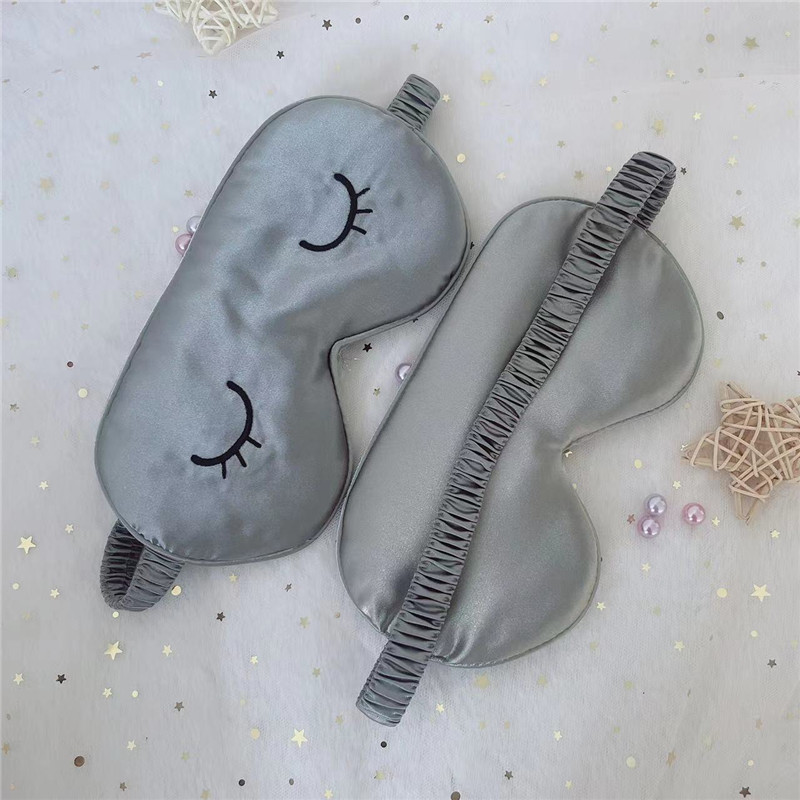 Máscara de ojo único de pestañas grises