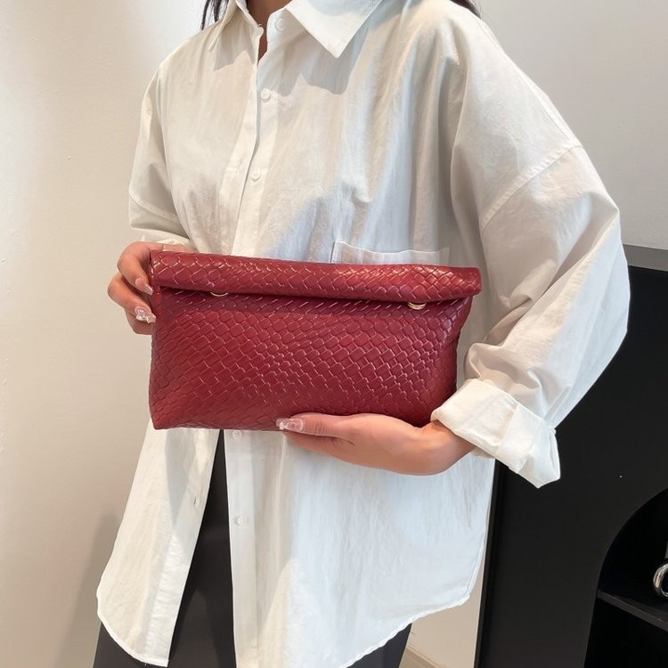 Bolsa de mano casual universal transfronteriza para mujeres nueva moda coreana simple bolsa de almohada de viaje
