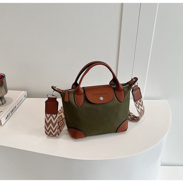Mini bolso de bolsillo de mano pequeña mujer 2025 nuevo estilo transfronterizo de tela de nylon ligera de moda ocio de hombro bolsa inclinada