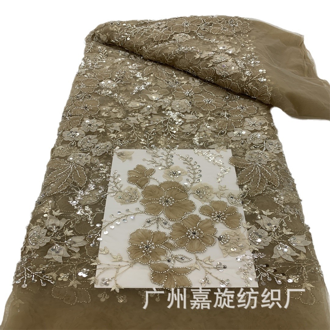 Tela de encaje con cuentas de estilo europeo y americano con diseño floral láser para vestidos de noche y trajes de lentejuelas para escenario. Encaje hecho a mano.