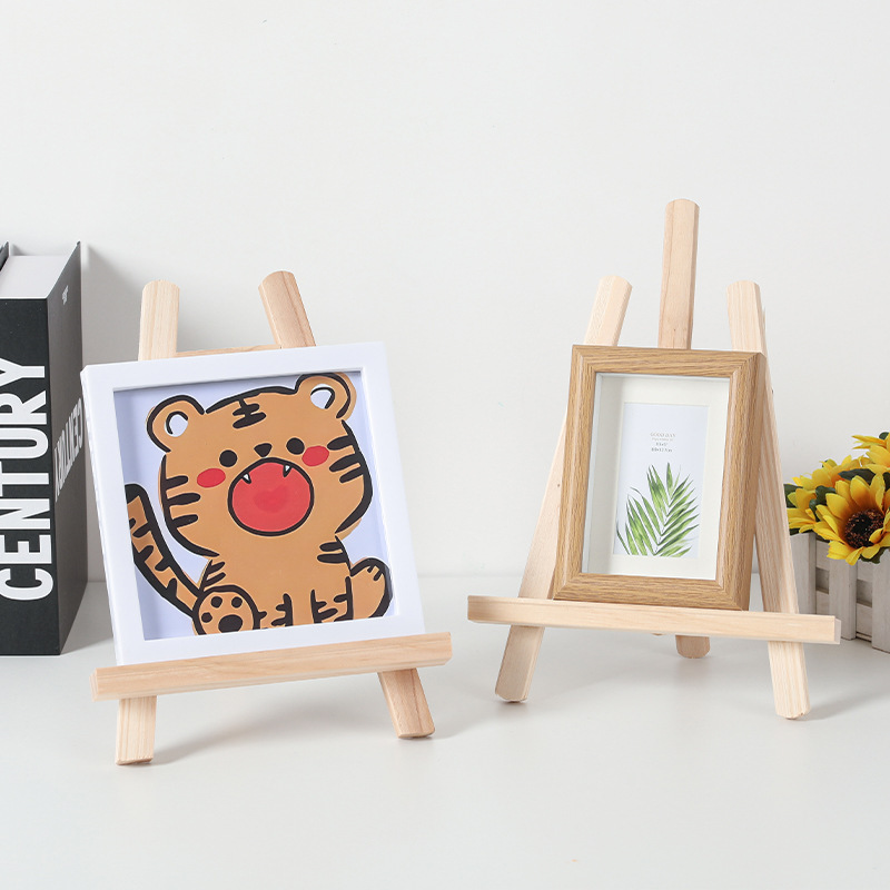 ミニの小さい絵の棚のデスクトップの卓上の画架の木製の折り畳みの油絵の板の上の三角のスタンド式のスケッチの子供|undefined