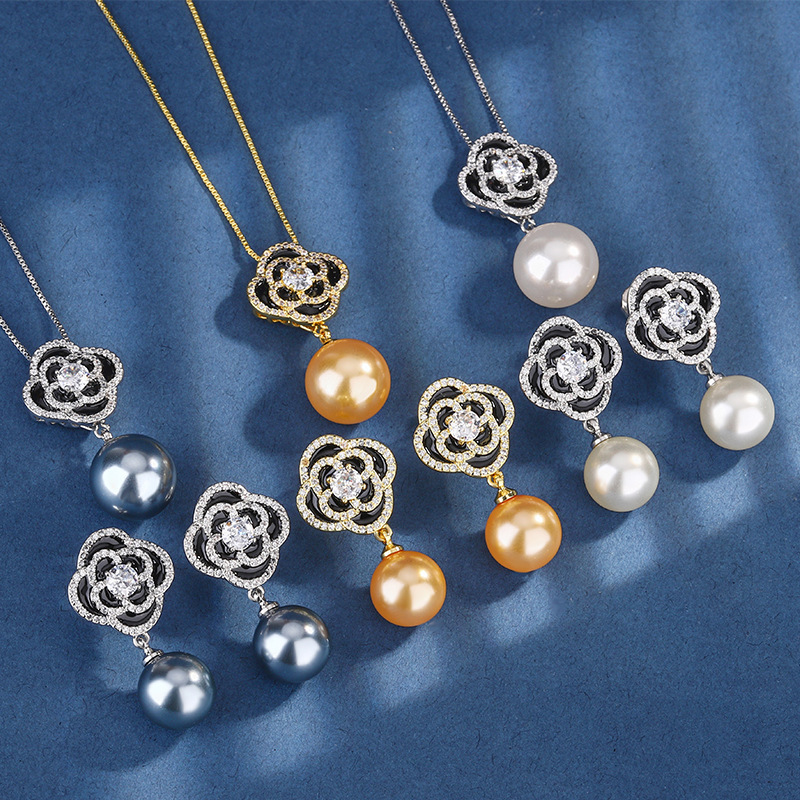 2024 nuevo estilo Zhuang Shengsheng joyería fondo de cobre chapado en oro con incrustaciones de perlas temperamento camelia traje femenino 16-14mm