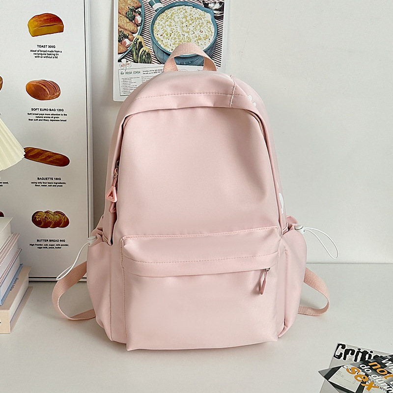 Mochila de gran capacidad para estudiantes de secundaria femenina simple y versátil para estudiantes de secundaria japonesa mochila de diseño