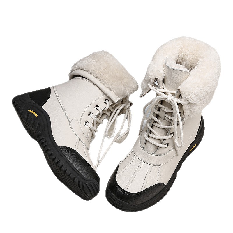 Nuevas botas de nieve de damas con base plana coreana botas de tubo medio de moda de invierno para mujeres zapatos de algodón caliente antideslizante grueso