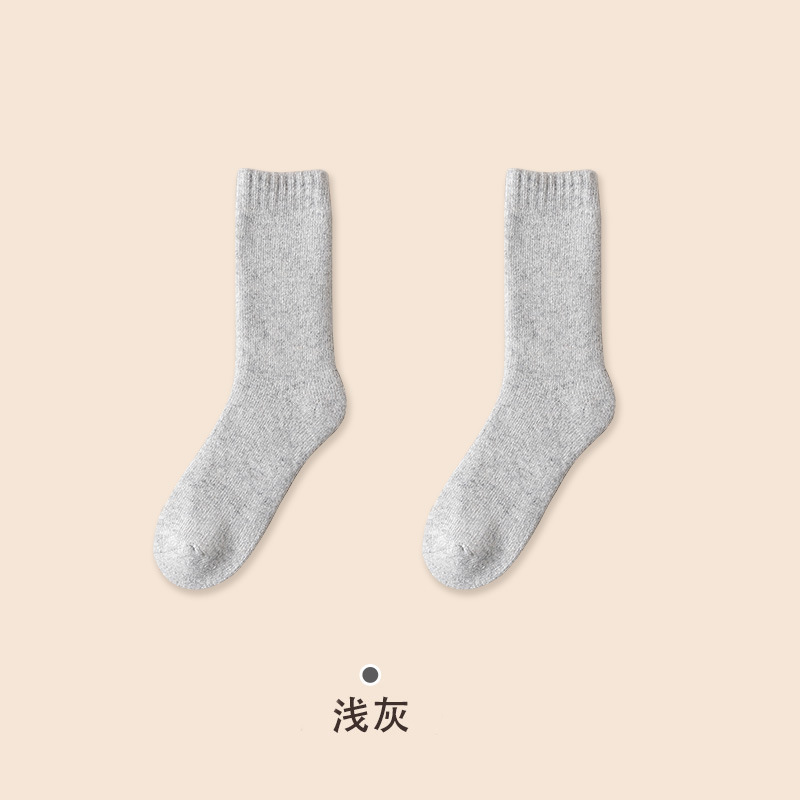 宝娜斯秋冬純色の巨大な厚いウールの靴下の女性の中筒の靴下の厚い保温の毛の靴下の冬のストッキングの卸売り