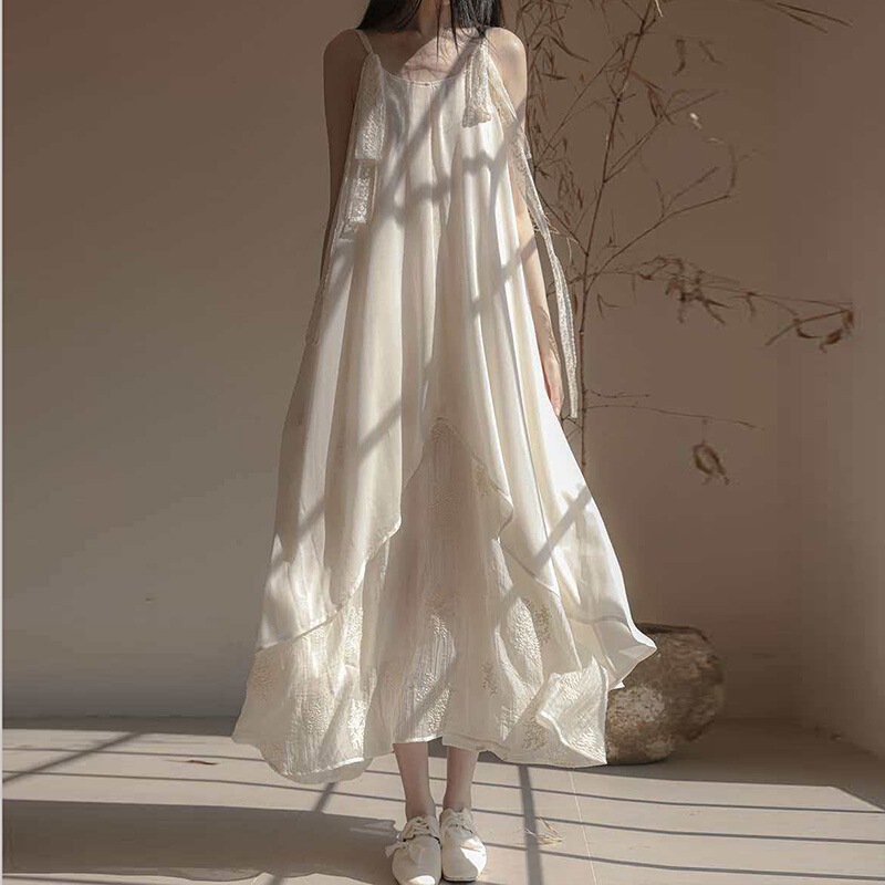 Elegant double-layer gauze dress with artistic embroidery, flowing lace straps, and a large hemline, 2026 summer sleeveless tank top long dress Elegant double-layer gauze dress with artistic embroidery, flowing lace straps, and a large hemline, 2026 summer sleeveless tank top long dress