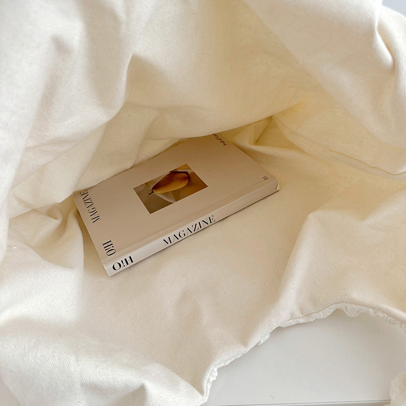 2023 nuevo plisado burbuja nube bolsa de hombro de moda todo fósforo nicho de compras de alta calidad de gran capacidad bolsa