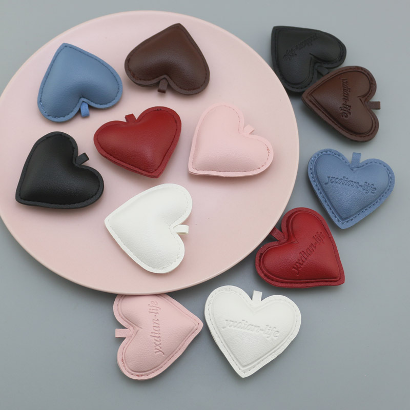 Creative three-dimensional leather heart love simple bag pendant keychain car accessories DIY accessories