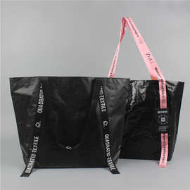 黑色手提覆膜彩印PP编织袋 广告促销编织蛇皮拉链手提飘带购物袋