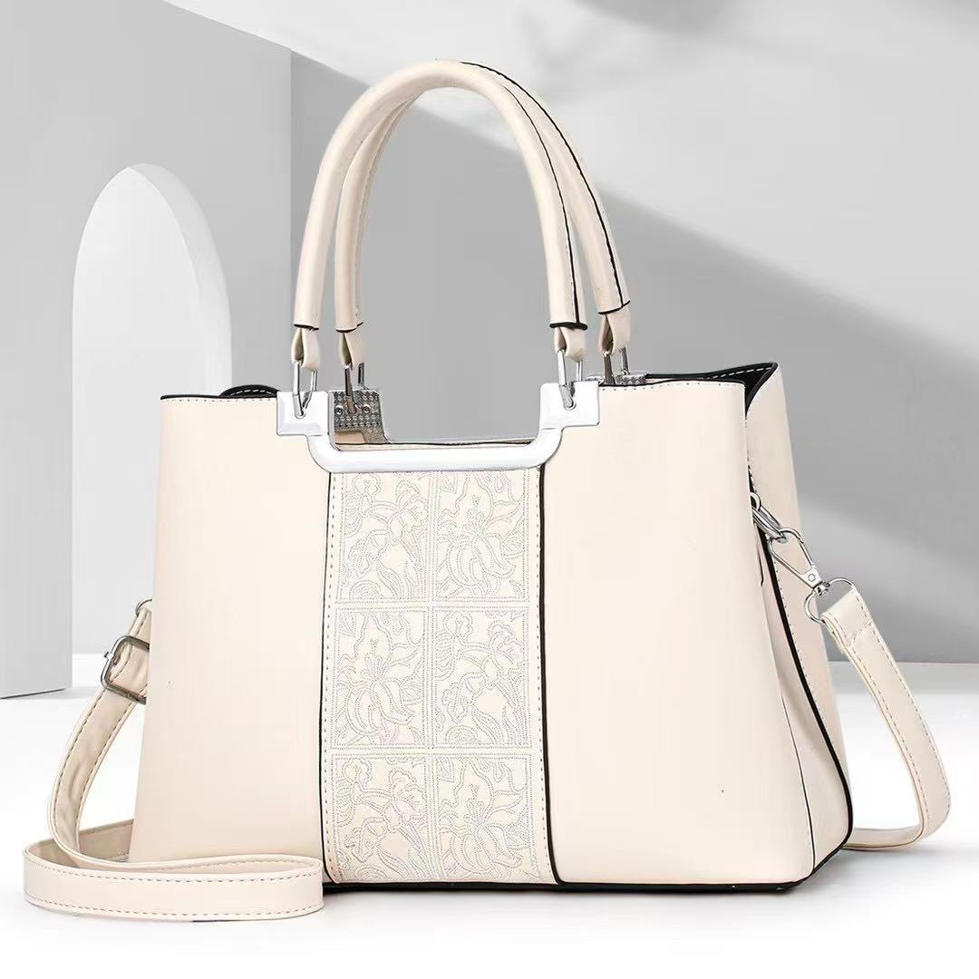 Bolso de madre atmosférico bolso de mujer simple de gran capacidad bolso de mensajero de hombro estilo explosivo bolso de marca de moda 2025