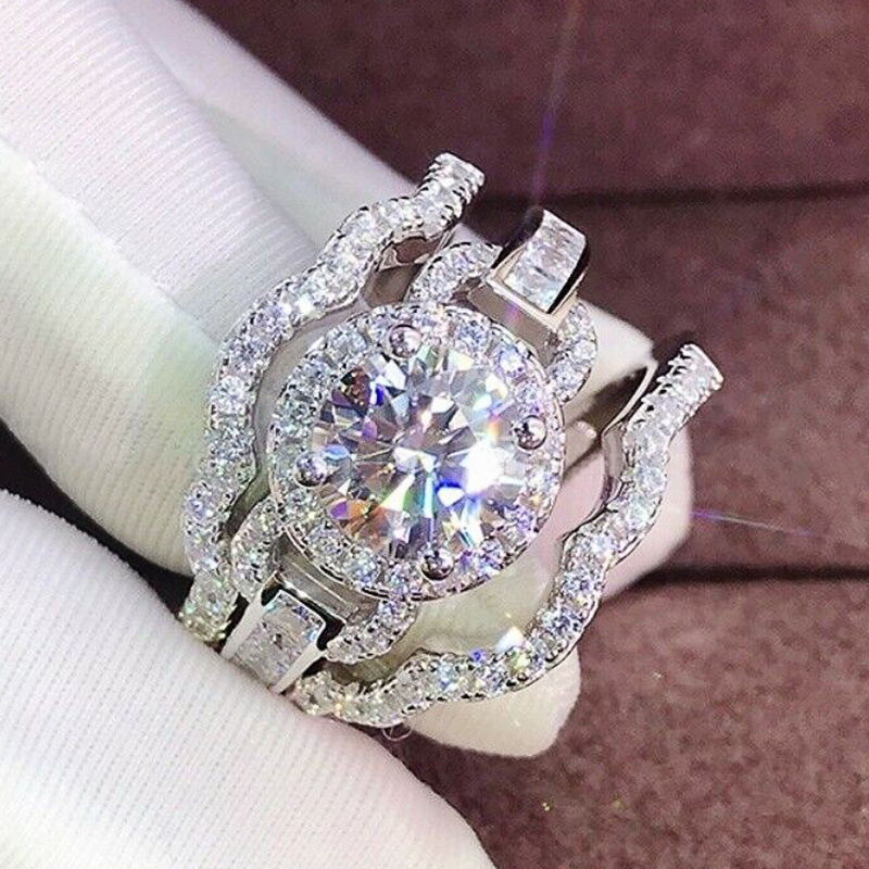 Cao Shi übertreibt das kreisförmige Taubenei mit drei Ringsätzen, die für Paare und den Valentinstag sehr aufmerksam sind_voghion.com