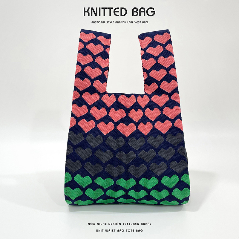 Diseño de nicho de tres colores Amor de punto hombro bolso de mano simple todo partido de gran capacidad bolso de mano al por mayor