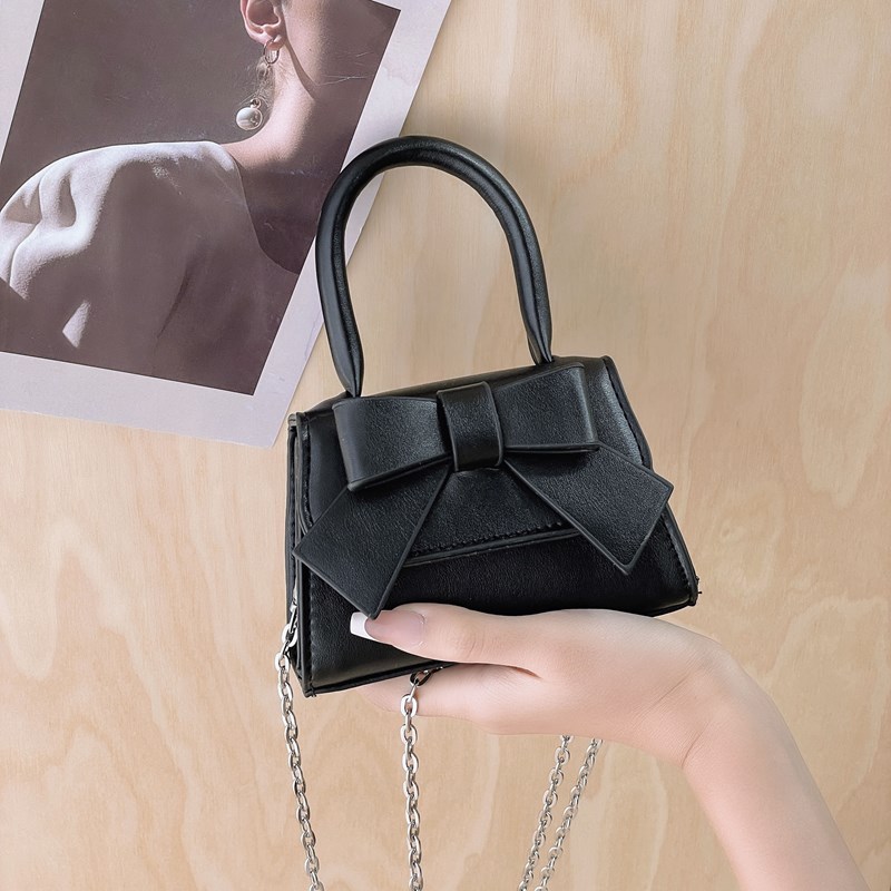 Bolso de mujer 2025 tendencia de primavera nuevo arco de moda para niños bolso de hombro de estilo extranjero bolso de mano