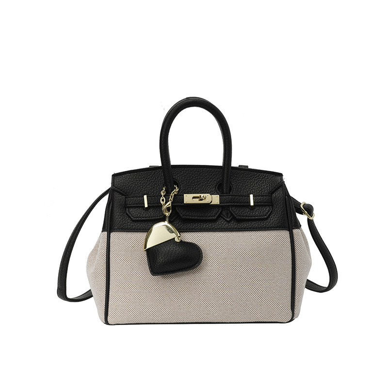Bolso de tela de mujer color contrastante empalme bolso portátil Kylie bolsa de gran capacidad transfronteriza alta sensación de viaje bolsa de mano