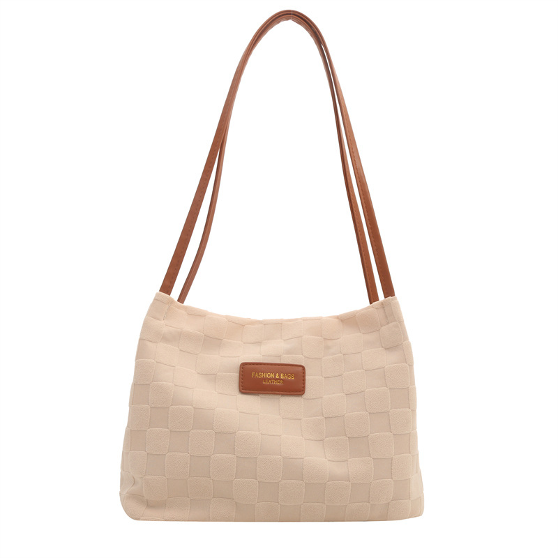 Nicho de diseño de bolsas de ajedrez para mujeres 2024 verano nuevo estilo para estudiantes de viaje al trabajo en clase de hombro único brazo bolso