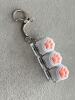 Three-button transparent shell-white cat claw-snake bone chain