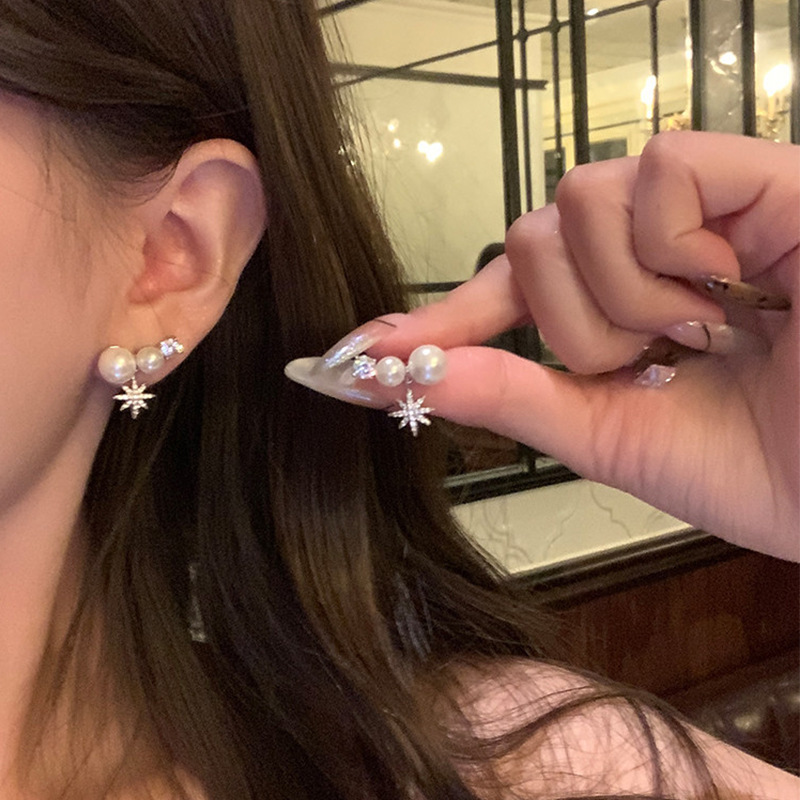 Corea del Sur explosión ultra inmortal cristal mariposa pendientes nicho femenino de alta calidad temperamento universal perla pendientes de orejas al por mayor